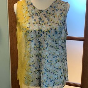Sleeveless Cabi blouse size large. Yellow and grey